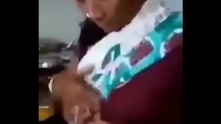 Indian Aunty is showing her boobs to nephew. Nephew is capturing it & kissing her.